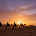 Tramonto nel deserto durante il tour tangeri marrakech 8 giorni